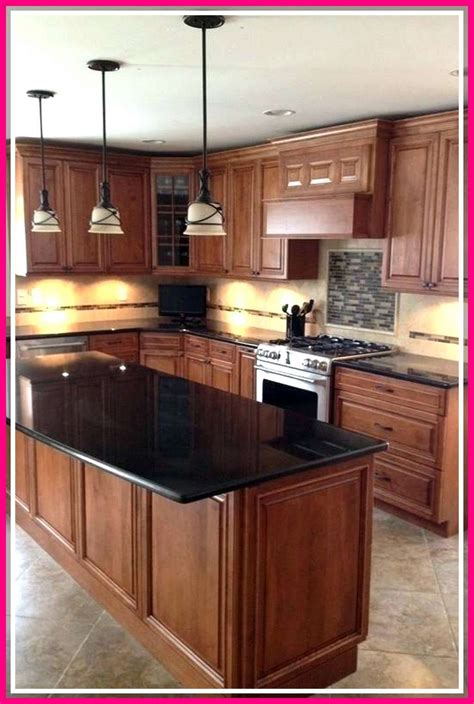 stainless steel appliances oak cabinets|oak cabinets with black hardware.